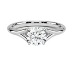 Close-up of a D-color VVS1 round brilliant moissanite on a structural open-twist pavé gold shank.