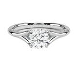 Close-up of a D-color VVS1 round brilliant moissanite on a structural open-twist pavé gold shank.