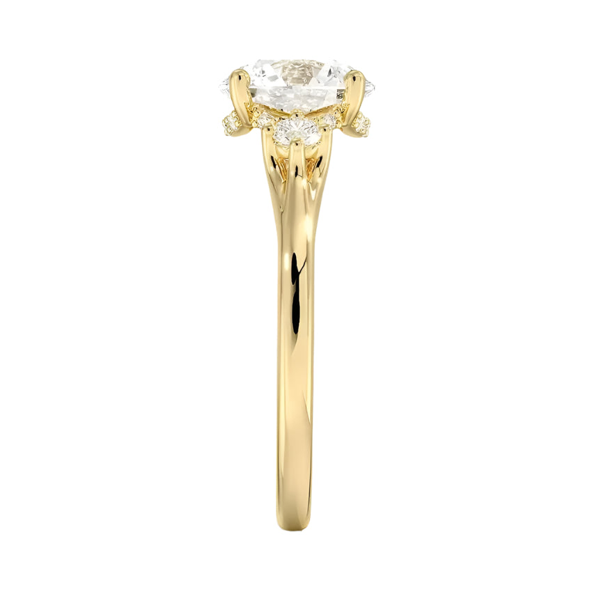 Four-prong round engagement ring in 18k yellow gold featuring a unique pedestal frame design and premium stones