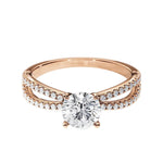 Top-down view of a D-color VVS1 round brilliant stone in a full double-twist pavé setting.
