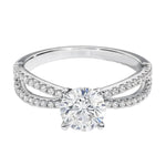 Top-down view of a D-color VVS1 round brilliant stone in a full double-twist pavé setting.