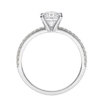Side profile of the Round Infinity Pavé ring showing both intertwining pavé-set gold bands