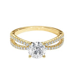 Top-down view of a D-color VVS1 round brilliant stone in a full double-twist pavé setting.