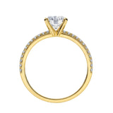 Side profile of the Round Infinity Pavé ring showing both intertwining pavé-set gold bands