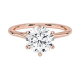 Round cut Moissanite lab grown diamond engagement ring round shank with a six claw setting, on a gold band, against a white background.Moissanite engagement ring cape town south africa grand diamonds ralph jacobs jeulia 