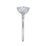 Round cut Moissanite lab grown diamond engagement ring round shank with a six claw setting, on a gold band, against a white background.Moissanite engagement ring cape town south africa grand diamonds ralph jacobs jeulia 