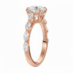 Unique bridal jewelry stack featuring a round cluster moissanite ring paired with a slim gold wedding band for a contemporary look