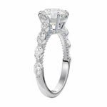 GRI certified round brilliant stellar cluster ring in a signature ApolloGem premium engagementr ring for a luxury proposal.