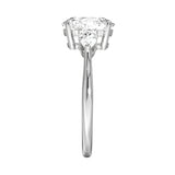 GRI certified round and pear moissanite ring in a signature ApolloGem premium LED-lit box for a luxury proposal.
