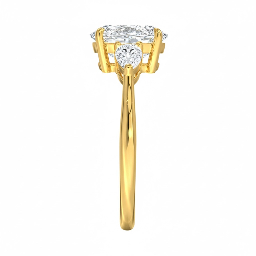 Close-up of a high-quality D-color VVS1 round brilliant moissanite center stone with pear accents guaranteed by a GRI certificate.