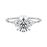 Six prong round moissanite ring with marquise accents and slim gold band