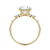 Gold ring with a diamond on a white background