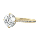 Side profile of the Round Royal Halo ring showing the clean solitaire basket and hidden halo