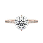 Secure four-claw cat-claw round brilliant moissanite ring with a hidden halo and pavé band in rose gold ApolloGem