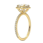 Classic round moissanite ring with halo setting and diamond band side view