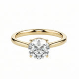 Classic round brilliant moissanite solitaire engagement ring in yellow gold ApolloGem.