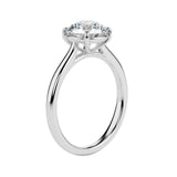 Detailed side view of the round solitaire showing the high-lift 4-prong crown architecture.
