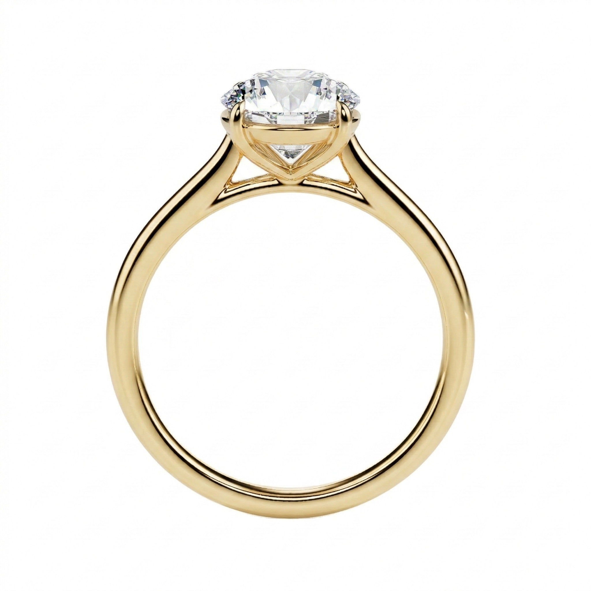 Symmetrical top-down view of a round moissanite solitaire in a polished solid gold setting.