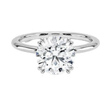 Round brilliant moissanite solitaire engagement ring with double cat-claw setting ApolloGem.