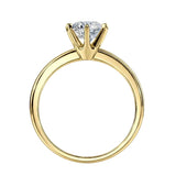 Symmetrical top-down view of a round moissanite solitaire in a polished 6-prong yellow gold setting.