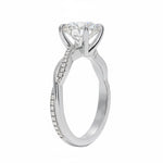 Side profile of the Round Solo Vine ring showing the contrast between the smooth gold and pavé-set strands in white gold.