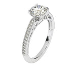 Dainty four-claw round brilliant moissanite ring with a thin pavé cathedral band in white gold ApolloGem.Round cut Moissanite lab grown diamond engagement ring with bridal stacking  pave on a gold band, against a white background.Moissanite engagement ring cape town south africa grand diamonds ralph jacobs jeulia 