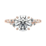 Close-up of D-color VVS1 round brilliant moissanite center stone with exceptional fire guaranteed by a genuine GRI certificate