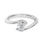 Close-up of a D-color VVS1 round moissanite showcasing its brilliant facets and floating aesthetic.