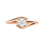 Round brilliant moissanite engagement ring with a modern rose gold tension setting ApolloGem.