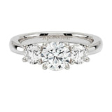 Classic round brilliant moissanite trilogy engagement ring in white gold gold ApolloGem.