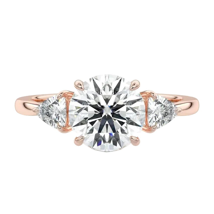 Luxury round brilliant moissanite engagement ring in rose gold featuring structural trillion cut side stones ApolloGem South Africa.