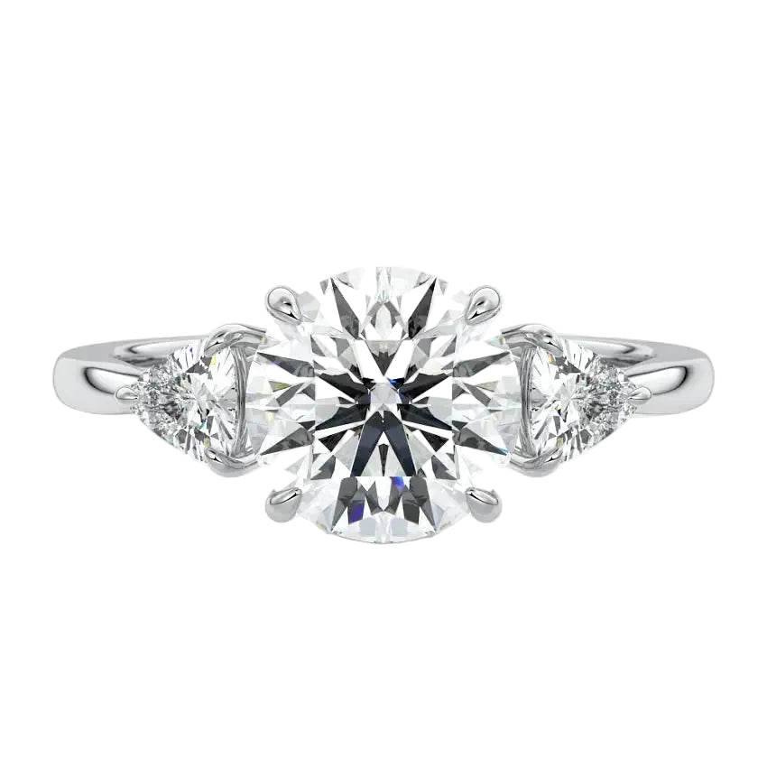 Close-up of a high-quality GRI certified D-color VVS1 round brilliant moissanite with sharp trillion side stones.