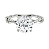 Round brilliant moissanite engagement ring with a twisted infinity-style white gold band ApolloGem.
