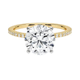  Integrated secure white gold claws on a warm gold sculpted solitaire band ApolloGem