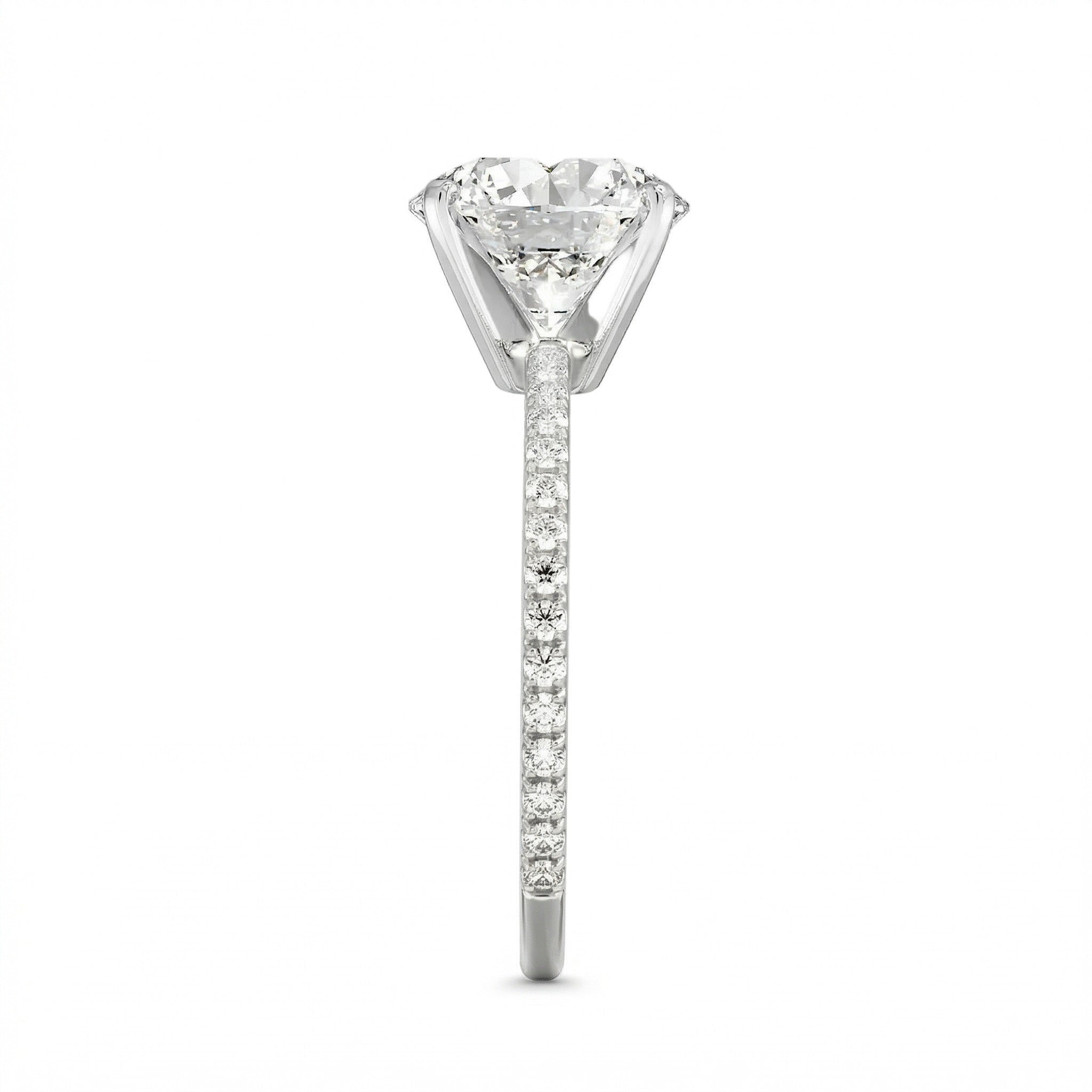 Top-down view of a D-color VVS1 round brilliant moissanite in a white gold solitaire setting.