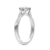 V-split round engagement ring on a finger showing the sophisticated architectural silhouette and shine