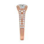 Top-down view of a D-color VVS1 round stone in a rose gold double-claw split-shank setting.