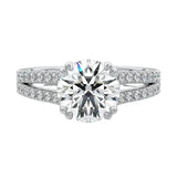 Secure double-claw round brilliant moissanite ring with a V-split pavé gold band ApolloGem.