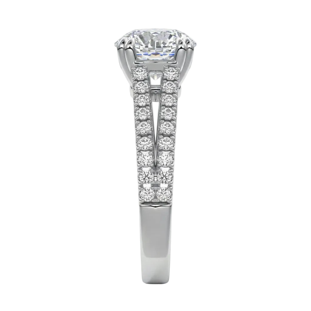 Top-down view of a D-color VVS1 round stone in a white gold double-claw split-shank setting.