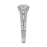 Top-down view of a D-color VVS1 round stone in a white gold double-claw split-shank setting.