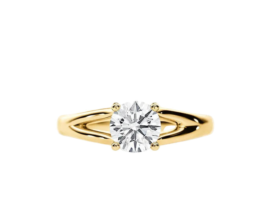 Close-up of a D-color VVS1 round moissanite held by elegant, sophisticated pin-claws.