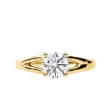 Close-up of a D-color VVS1 round moissanite held by elegant, sophisticated pin-claws.