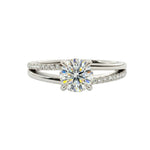 Dainty four-claw round brilliant moissanite ring on an asymmetric V-shape wishbone white gold band ApolloGem.