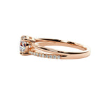 Side profile of the Round Wishbone Solo ring showing the clean solitaire basket and single-side pavé.
