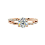 Dainty four-claw round brilliant moissanite ring on an asymmetric V-shape wishbone rose gold band ApolloGem.