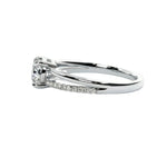 Side profile of the Round Wishbone Solo ring showing the clean solitaire basket and single-side pavé.