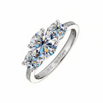 Detailed side view of the Royal Trinity ring showing the three-stone setting and micro-pavé accents.