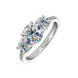 Detailed side view of the Royal Trinity ring showing the three-stone setting and micro-pavé accents.