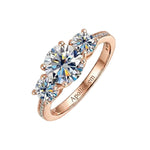 Detailed side view of the Royal Trinity ring showing the three-stone setting and micro-pavé accents.