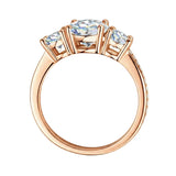 Three-stone round brilliant engagement ring with a shimmering pavé shank and GRI certified stones.